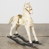 A Folk Art Painted Wooden Rocking Horse