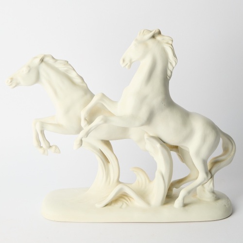 A Large Royal Dux Galloping Horses Statue