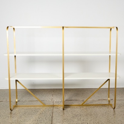 A Brass Frame Shelving Unit with White Lacquer Tiers