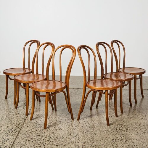 A Set of Six Walnut Cintesi Twist Bentwood Chairs