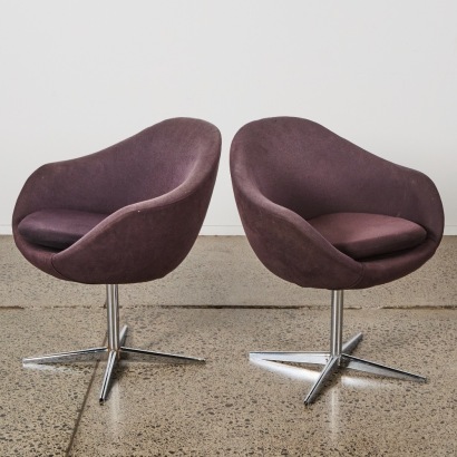 A Pair Of Mid Century Swivel Tub Chairs
