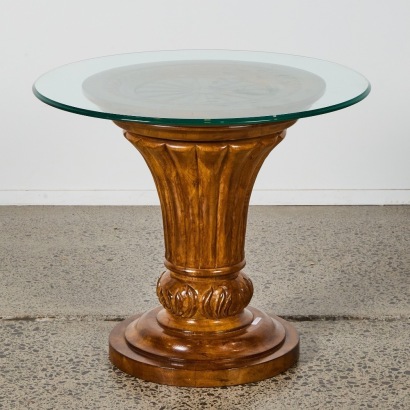 An Ornate Hand Carved Timber Based Coffee Table with Glass Top