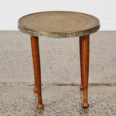A Small Hammered Metal Table