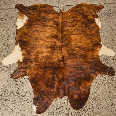 A Cow Hide Rug