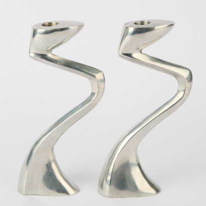A Pair of Stainless Steel Matthew Hilton Candle Holders