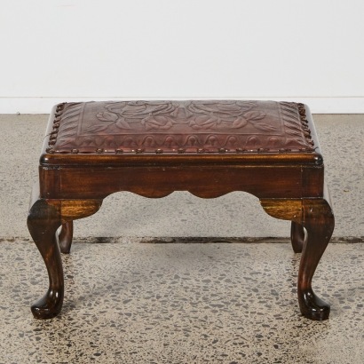 An Antique Leather Embossed Wood Footstool