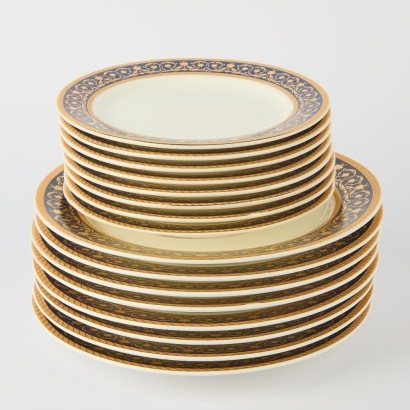 A Set of Porcelain and Gilt Serving Plates