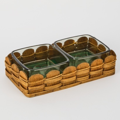 A Pair of Section Glass Nut Holder In A Woven Wood Basket