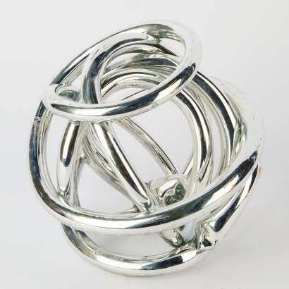 An Abstract Silver Knot Table Feature