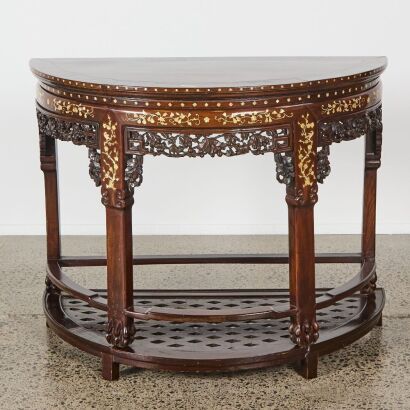 A Late 19th to Early 20th Century Chinese Hardwood and Mother-of-Pearl Inlaid Carved Demi-lune Table