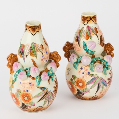 A Pair of Chinese Porcelain Vases with Gilt Detailing