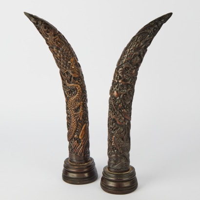 A Faux Ivory Carved Dragon
