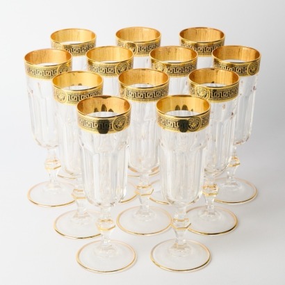 A Set of Twelve Versace Wine Glasses with Gilt Design