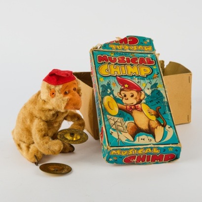 An Original Musical Chimp Wind Up Toy