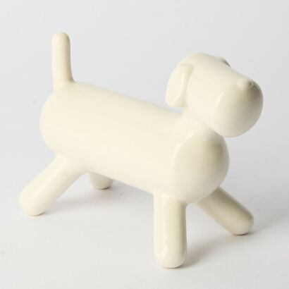 A Porcelain White Dog Statue
