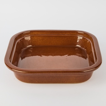 A Large Glazed Earthenware Baking Dish