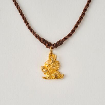 A Chinese Gold Dragon Pendant, 24k