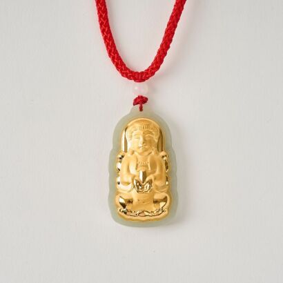 A Chinese Gold and Hetian Jade Buddha Pendant