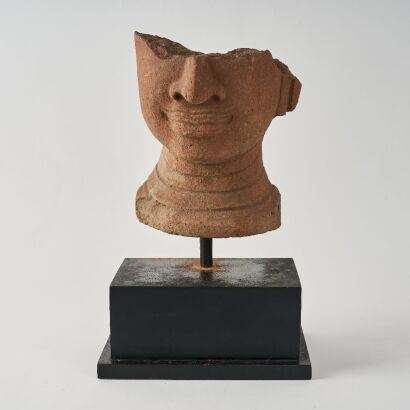 A Nepalese 14th&ndash;15th Century Pottery Head Of Buddha