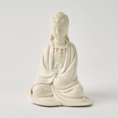 A Chinese Qing Dynasty Dehua Blanc-De-Chine Seated Guanyin