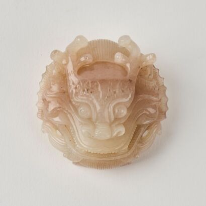 A Chinese Qing Dynasty Jade 'Mythical Beast Head' Belt Hook