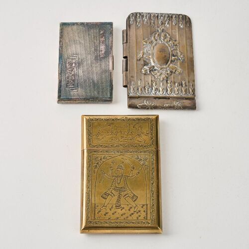 A Set of Three Decorated Metal Card Cases