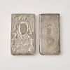 A Set of Two Decorated Silver Card Cases