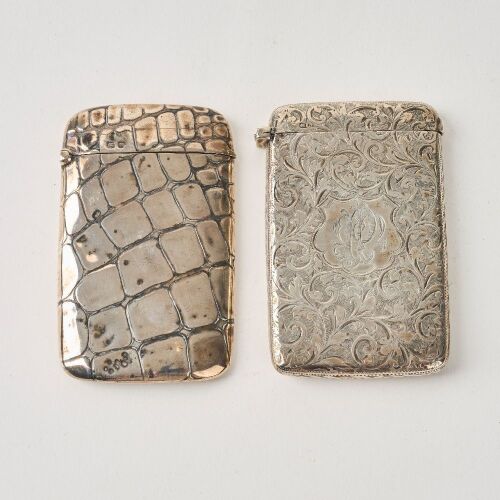 A Set of Two Decorated Silver Card Cases