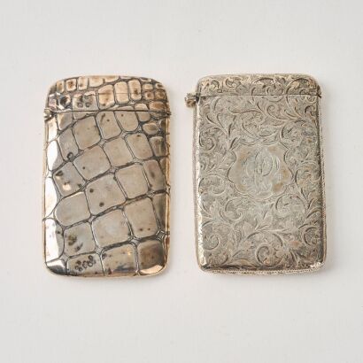 A Set of Two Decorated Silver Card Cases
