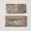 A Set of Two Decorated Silver Card Cases