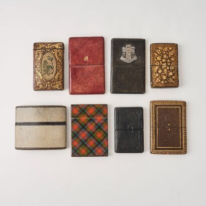 A Group of Eight Decorative Leather Card Cases