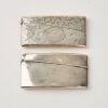 A Set of Two Decorated Silver Card Cases