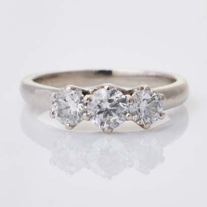 Platinum, 0.70ct Diamond Three Stone Ring