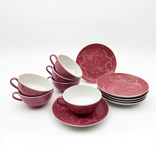 Chinese Pink Glazed Incised 'Dragon' Tea Cups and Saucers