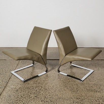 A Pair of 1990s Postmodern Cantilever Chairs With Matching Side Table