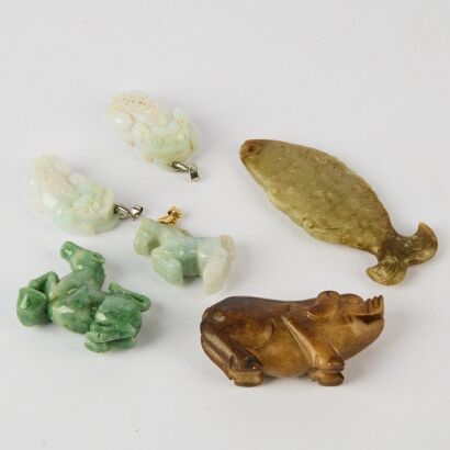 A Group of Four Chinese Aged Jade Ornaments