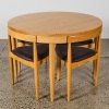 A Hans Olsen Roundette Style Dining Table With Four Nested Chairs - 2