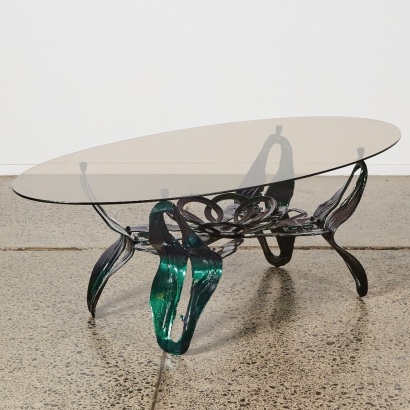 A 1950's Brutalist Smoked Glass Coffee Table