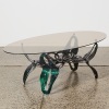 A 1950's Brutalist Smoked Glass Coffee Table