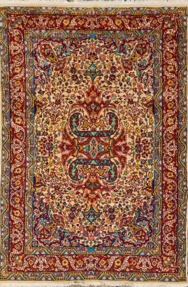 A Silk and Wool Hand-Knotted Mashad Persian Carpet