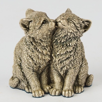 A Sterling Silver Ornament Modelled As Hugging Cats