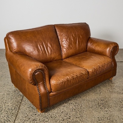 A Natuzzi Two-Seater Leather Chesterfield Sofa