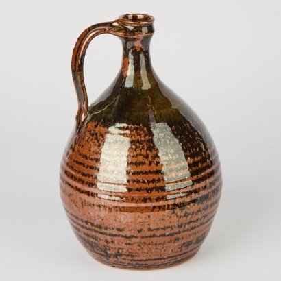 A Large John Macassey Bottle