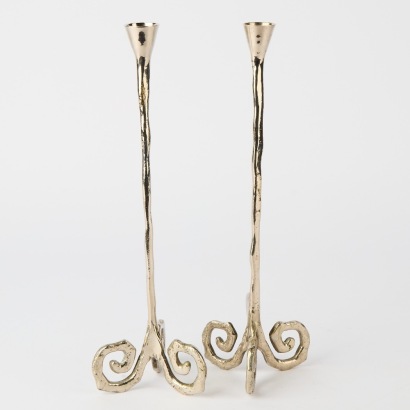 A Pair of Cast Aluminium Candlesticks