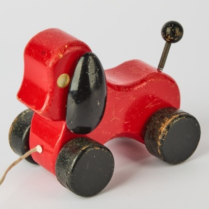 A Vintage Red Pull-a-long Dog