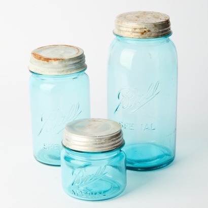 A Set of Three Industrial Glass Jars