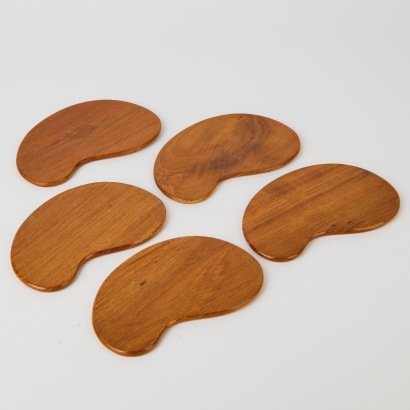 A Set of Five Mid-Century Teak Coasters