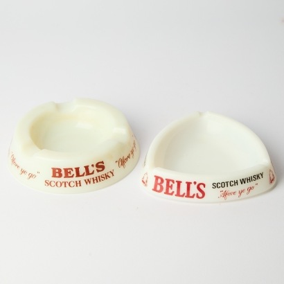 A Pair of Vintage Bells Whiskey Ashtrays