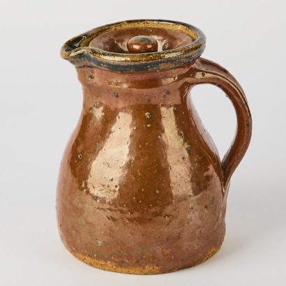 A Barry Brickell Lidded Water Jug in a Tenmoku Glaze
