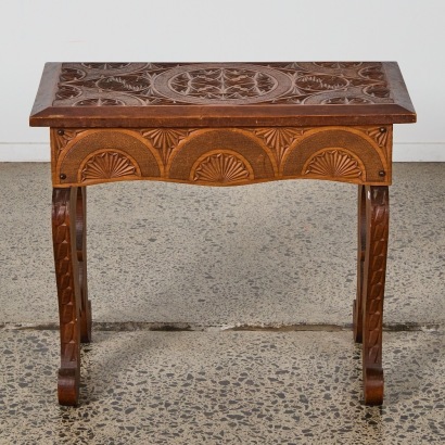 An Arts and Crafts Carved Chip-Carved Stool